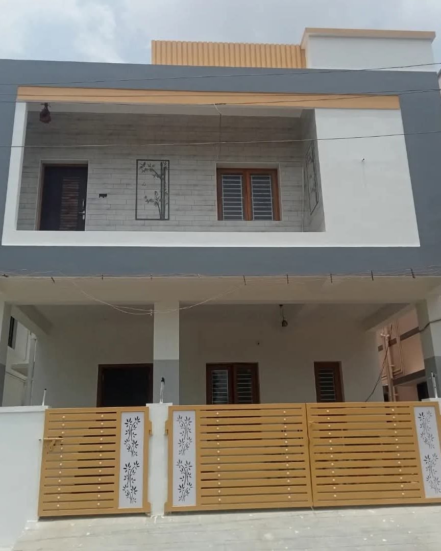Completed two-storey residential elevation with gated entrance